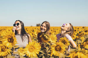 Happy friends wearing zinc oxide and best reef safe  sunscreen on their nose, from our summer collection.